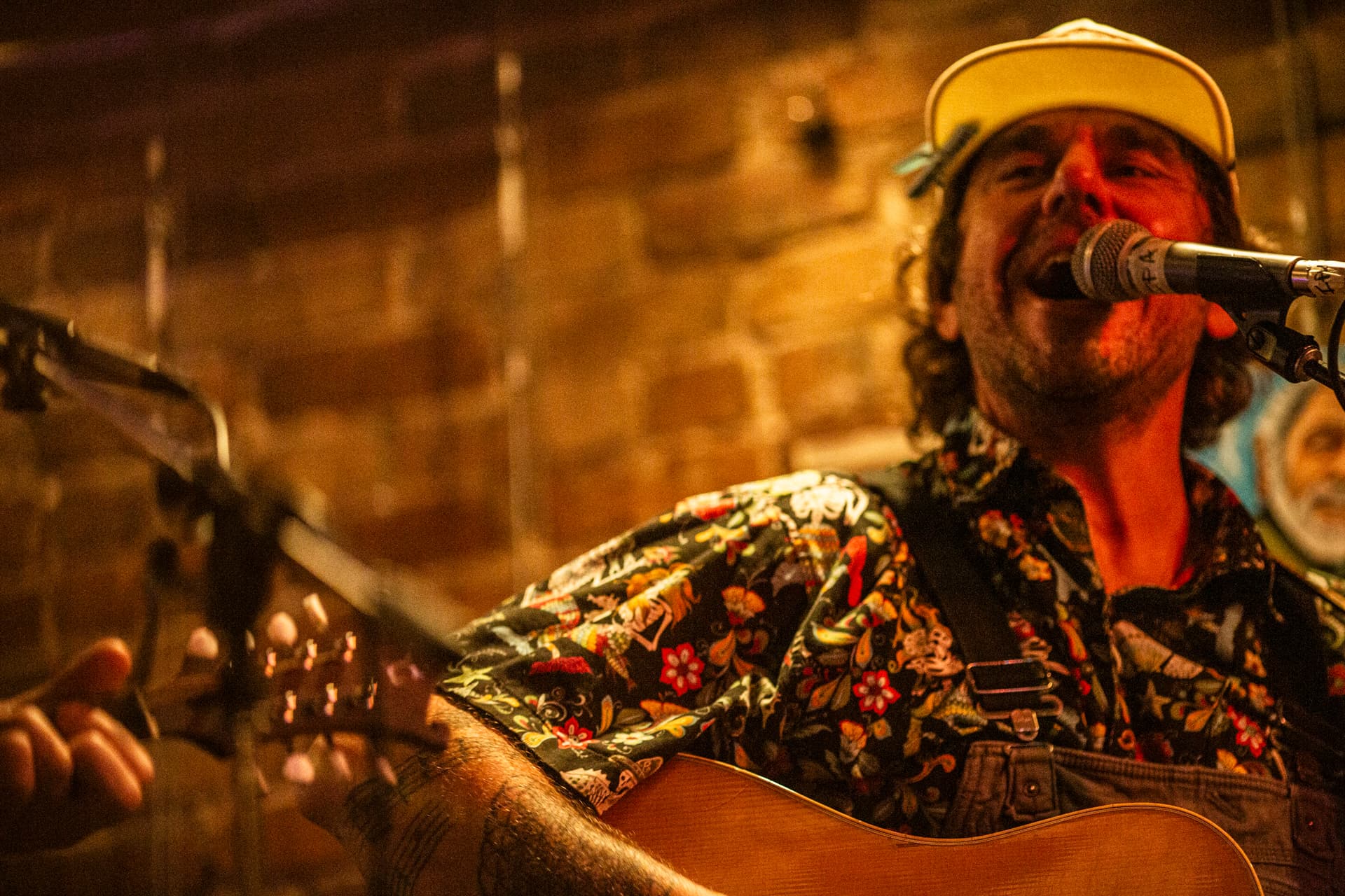 Ty Stonehawker singing, head tilted upward