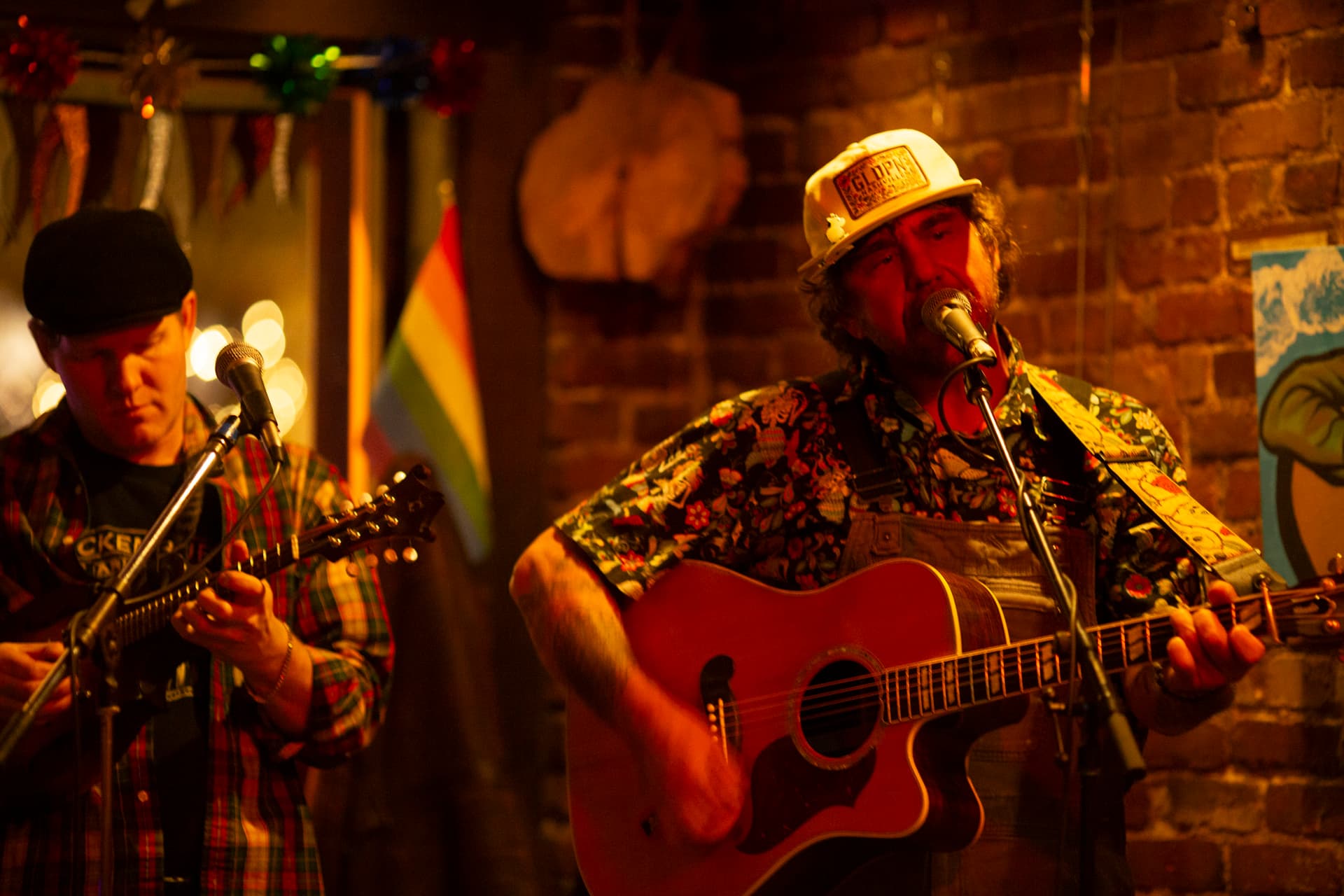 Ty Stonehawker singing alongside a bandmate
