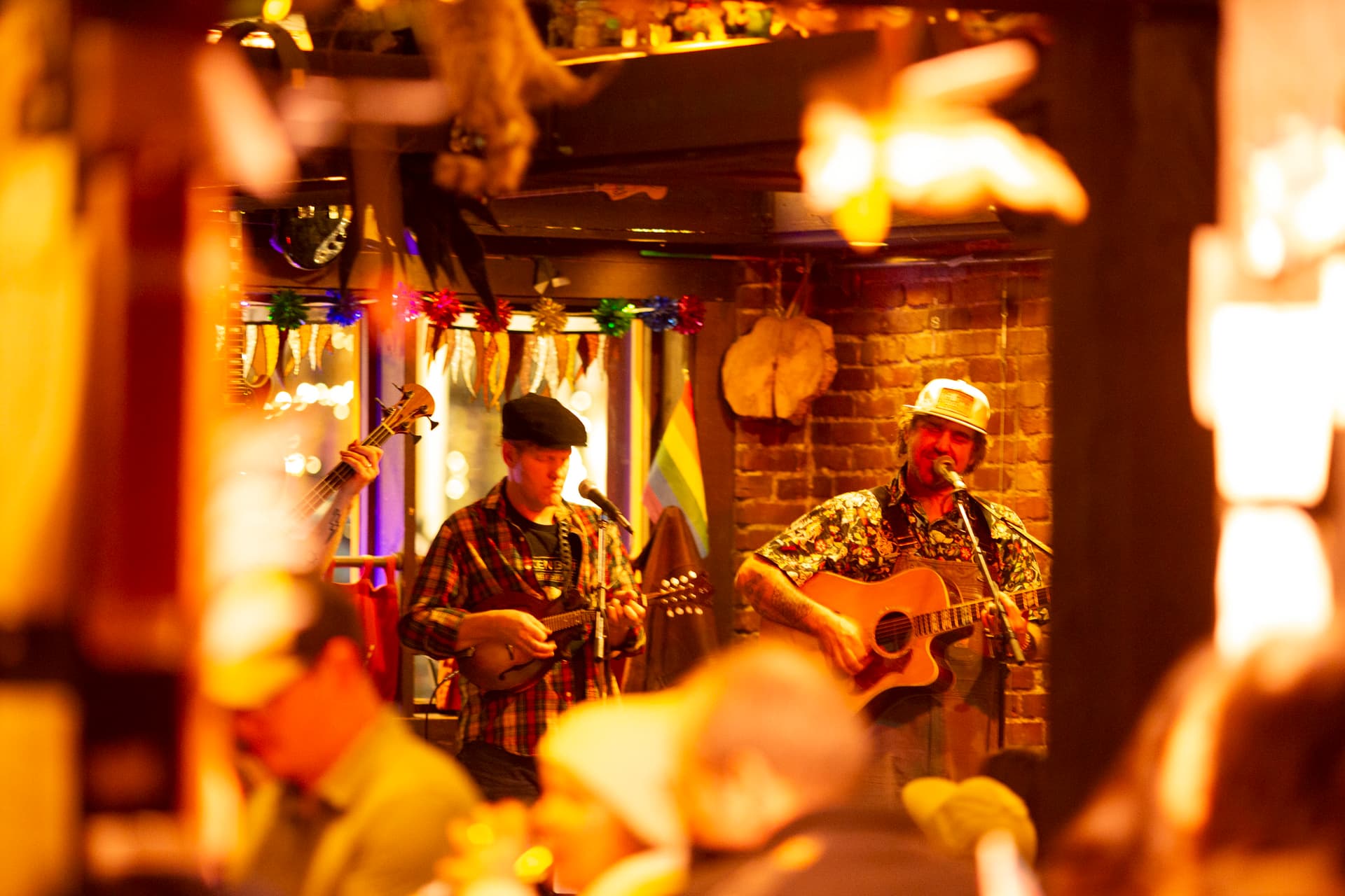 Ty Stonehawker playing guitar alongside a bandmate