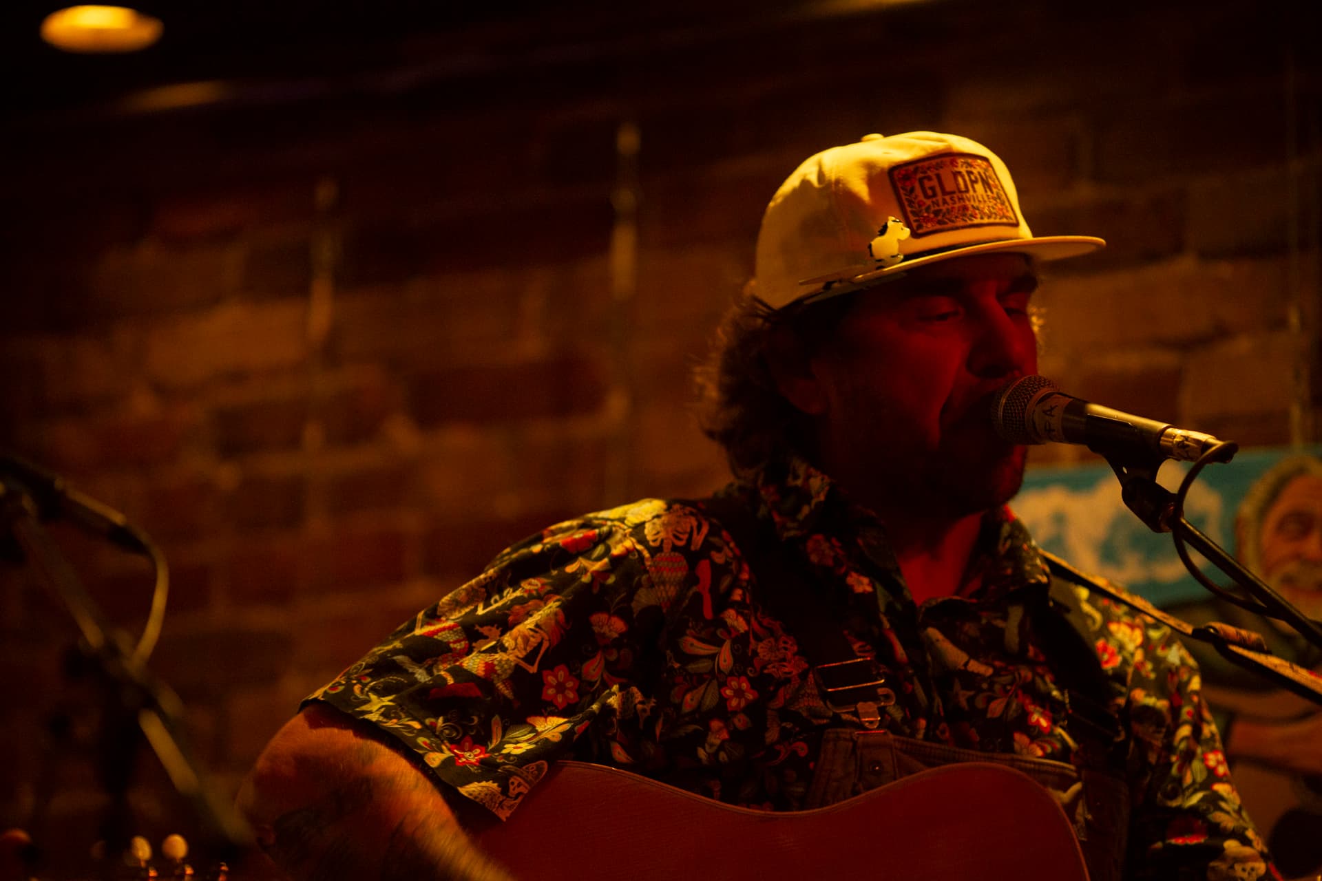 Ty Stonehawker singing solo with guitar