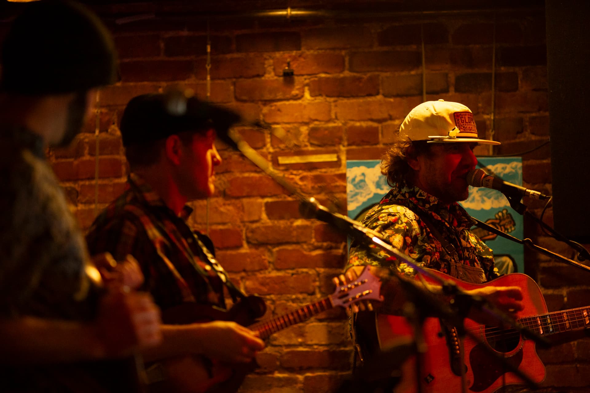 Ty Stonehawker singing with intensity on stage