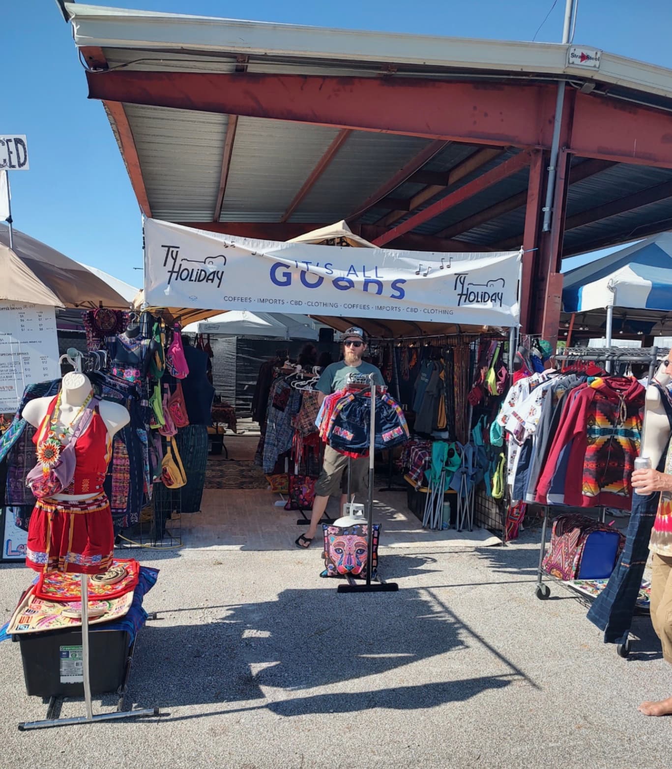 Handcrafted garments and woven textiles on display